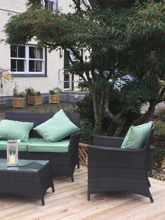Corran Bunkhouse Hotel ภายนอก รูปภาพ The garden of the hotel